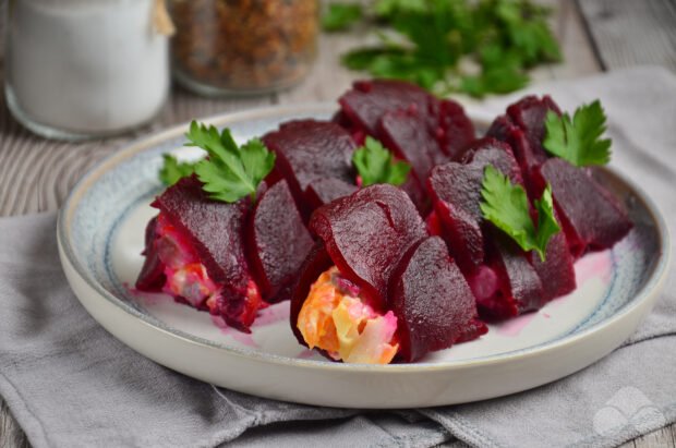 Herring under a fur coat in rolls