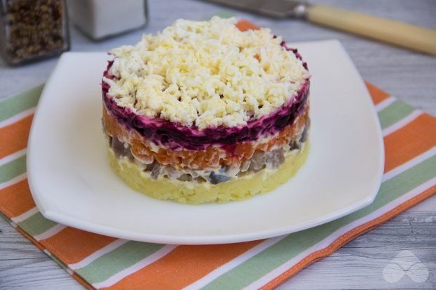 Herring under a fur coat with melted cheese