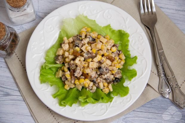 Salad with cheese, sprats and corn