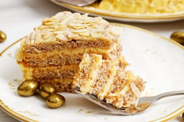 Honey cake with custard and almond petals