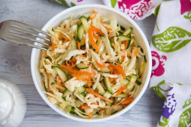 Spicy salad of cucumbers, cabbage and Korean carrots