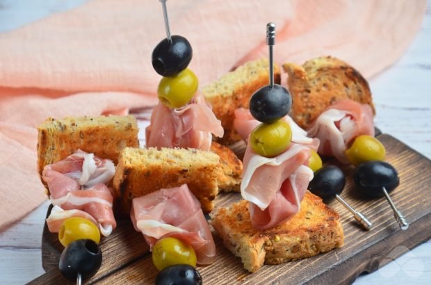 Canapes with olives and olives