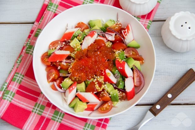 Salad with crab sticks and red caviar