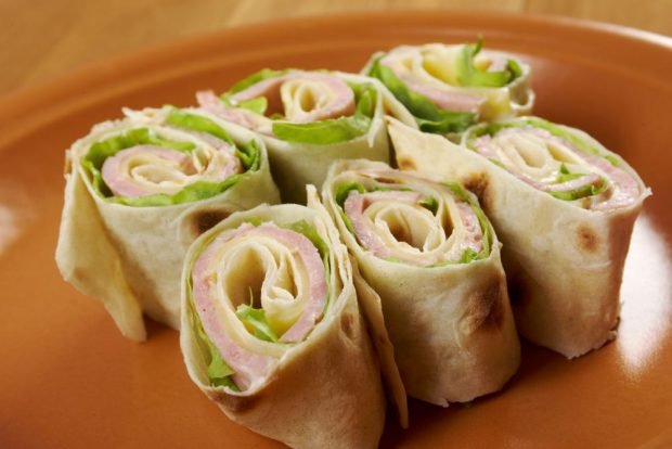 Lavash roll with ham and cheese is a simple and delicious recipe, how to cook step by step