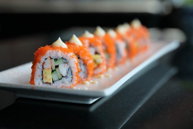 Rolls with cucumber, avocado and crab sticks