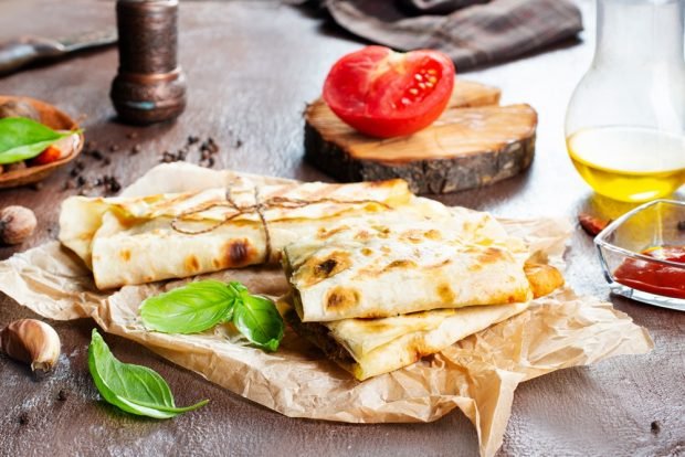 Pita bread sandwiches in a frying pan