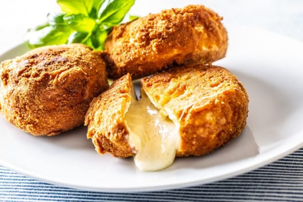 Fried camembert in breading