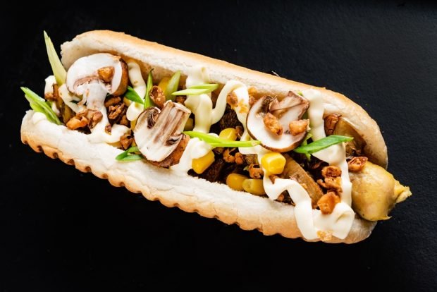 Hot dog with mushrooms and corn