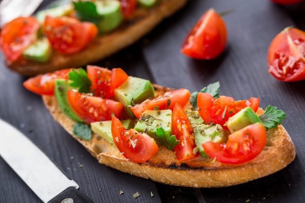 Bruschetta with avocado and tomatoes