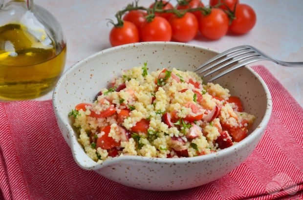 Salad with couscous, herbs and cranberries