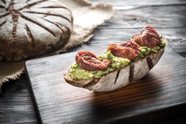 Bruschetta with avocado and dried tomatoes 