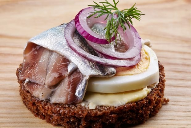 Canapes with herring and egg