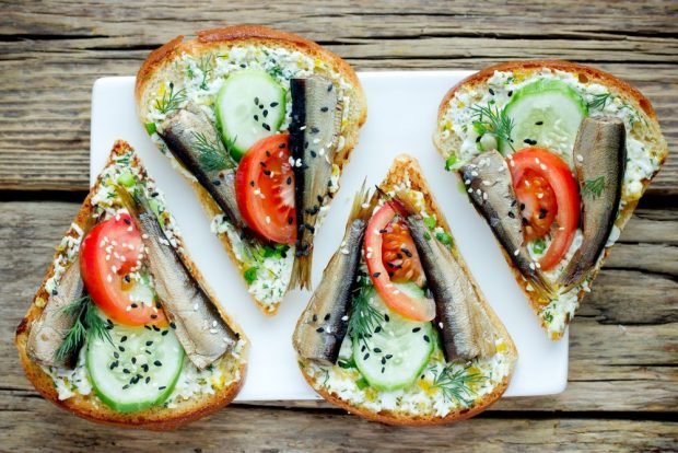 Sandwiches with sprats for the festive table