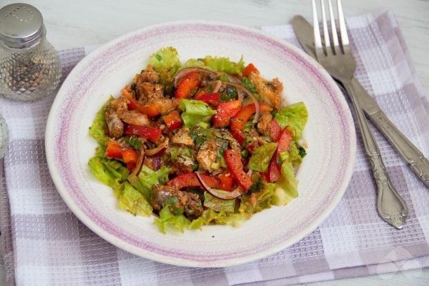 Spicy salad with fish in tomato