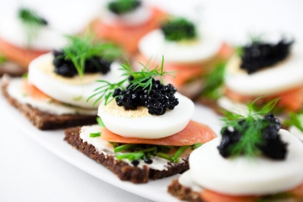 Canapes with smoked salmon and caviar