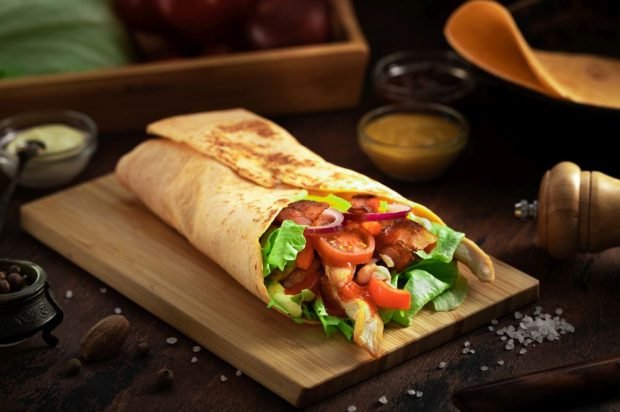 Shawarma with chicken, bacon and vegetables is a simple and delicious recipe, how to cook step by step