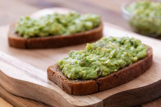 Classic guacamole with avocado and tomatoes