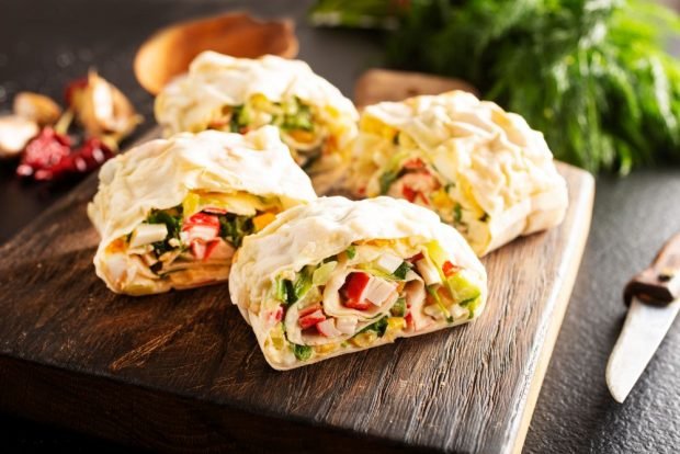 Lavash roll with crab sticks and egg 