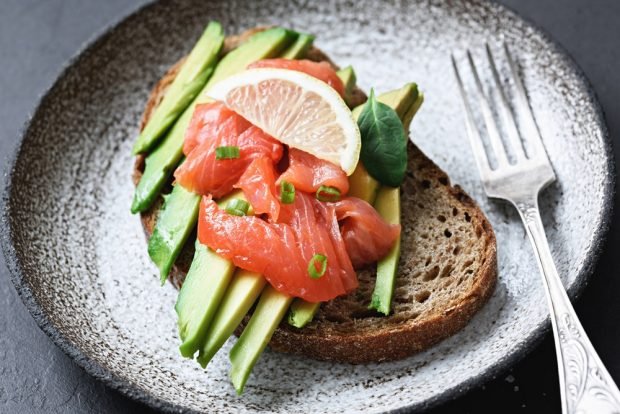 Sandwiches with smoked pink salmon for a festive table