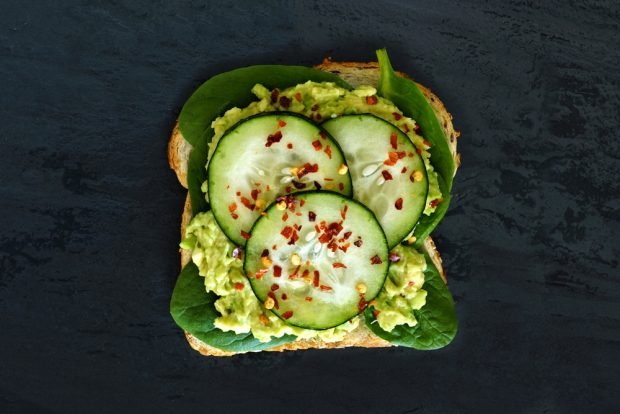 Sandwich with guacamole and cucumbers 