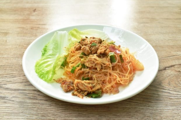 Funchosa salad with pork and spicy dressing