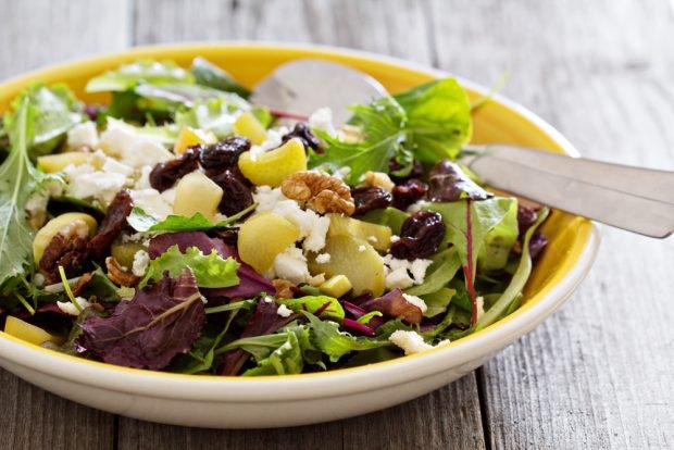 Salad with herbs, baked rhubarb and feta