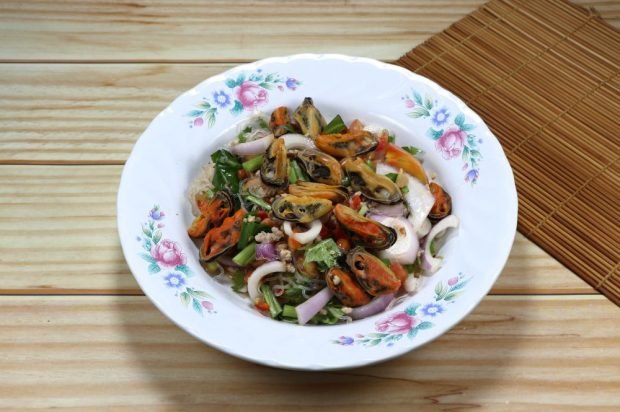 Salad of funchosa, pickled mussels and vegetables