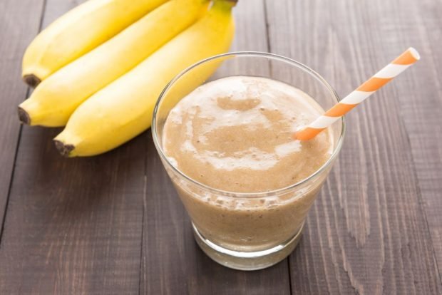 Smoothie with banana in a blender 