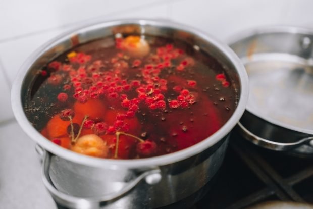 Homemade compote of garden fruits and berries 