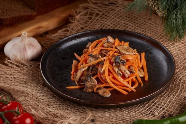 Salad of Korean carrots and fried mushrooms 