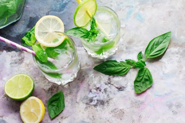 Lemonade with basil and lemon at home