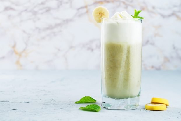 Milkshake with banana in a blender 