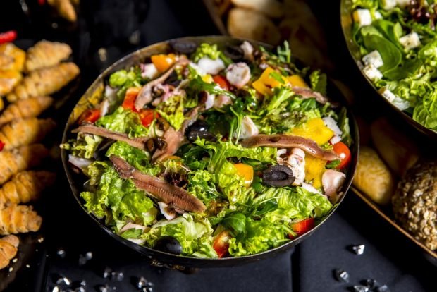 Salad with canned fish and champignons