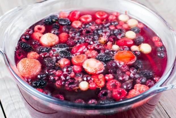 Compote of frozen berries in a saucepan 