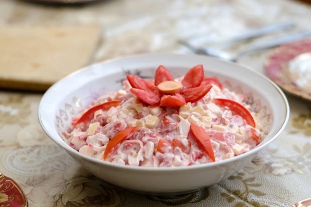 Diet salad with tomatoes and crab sticks is a simple and delicious recipe how to cook step by step