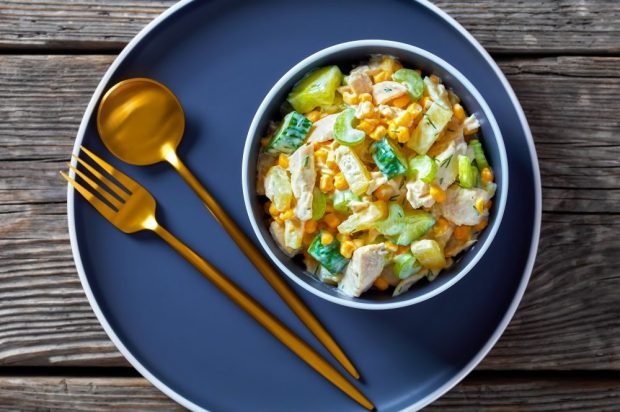 Meat salad with chicken, celery and pineapples 