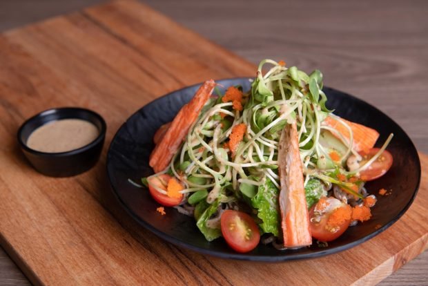 Salad with crab sticks and sprouted grains