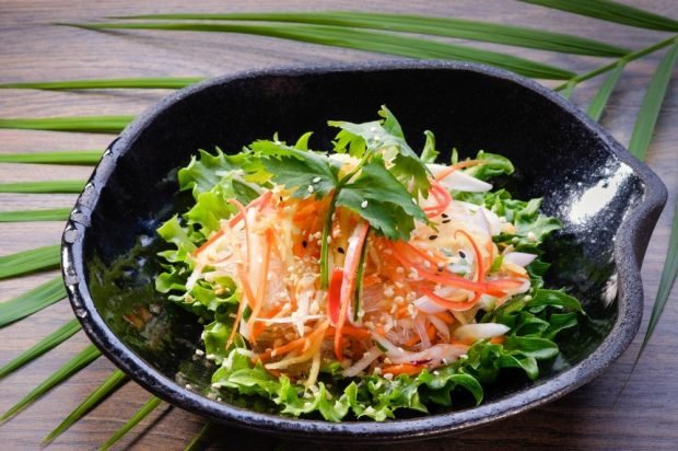 Salad of funchosa, radish and carrots