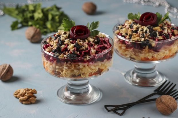 Puff salad with beetroot, prunes and nuts