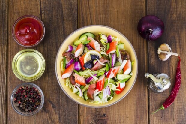 Salad with crab sticks and fresh vegetables