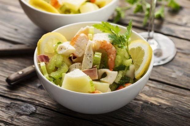 Salad with seafood, potatoes and celery