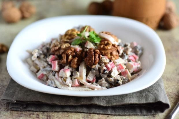 Salad of crab sticks, squid and walnuts