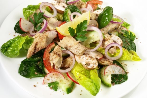 Salad with canned fish and mushrooms