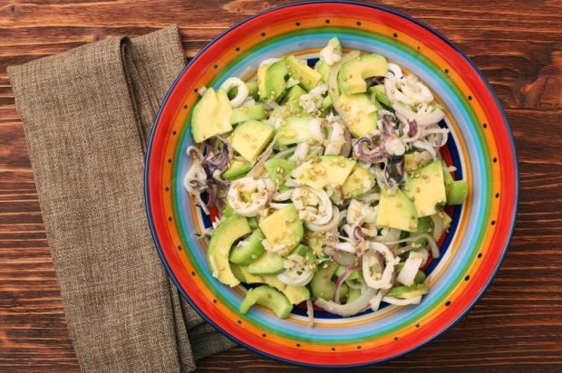 Salad with avocado, squid and octopus