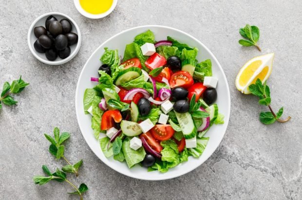 Greek salad with feta, lettuce and mint