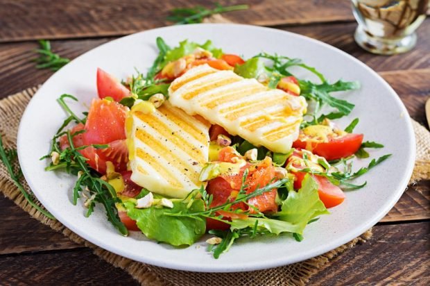 Festive salad with red fish and fried haloumi cheese is a simple and delicious recipe, how to cook step by step