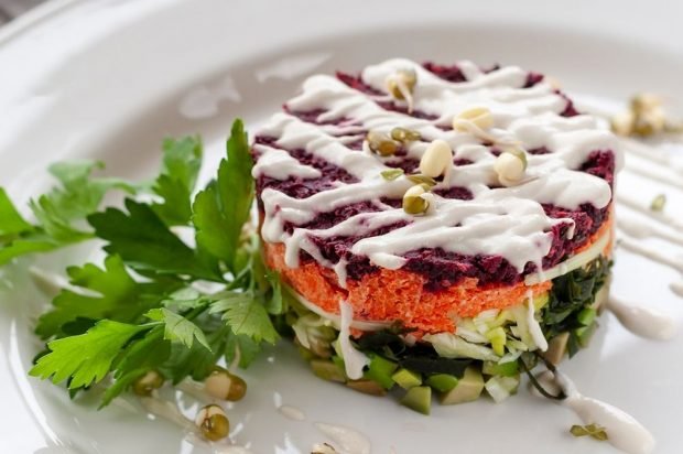 Puff salad with seaweed, avocado and boiled vegetables