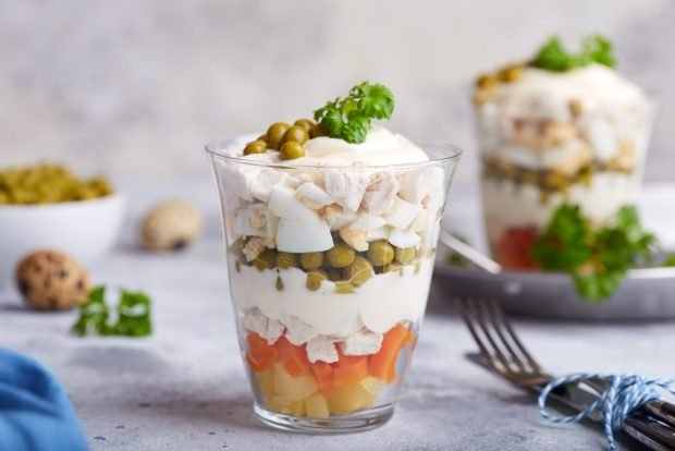 Layered salad Olivier – a simple and delicious recipe, how to cook step by step