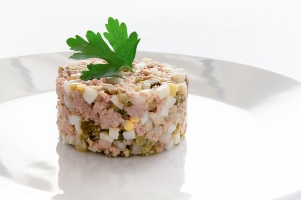 Salad with cod liver and pickled cucumbers