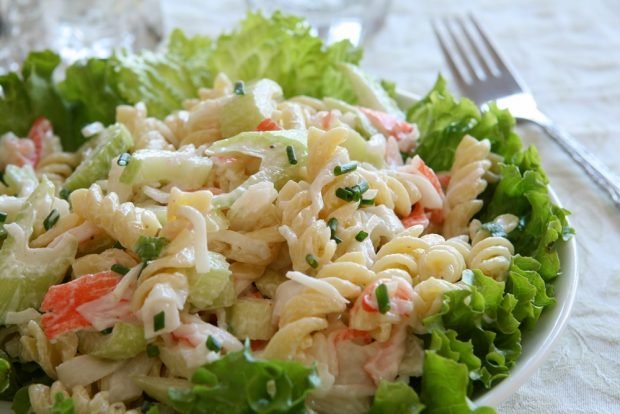 Salad with pasta, crab meat and celery